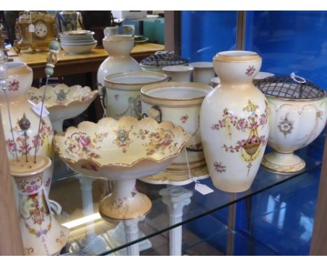 A Quantity of Carlton Blushware, including two pillar vases, two posy vases, hat pin stand, tea pot trivet and a biscuit barr