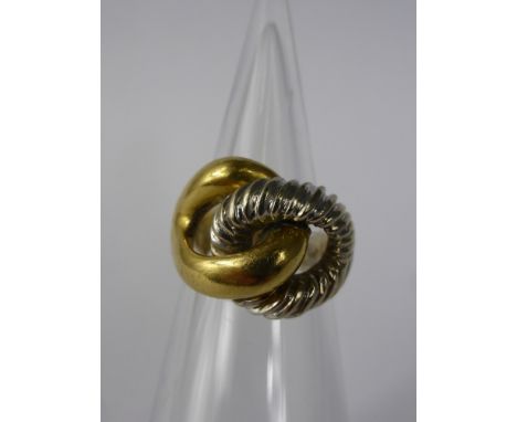 A Lady's 18ct Yellow and White Gold 'Knot Ring', mm CPJ, size K, approx 8.6 gms