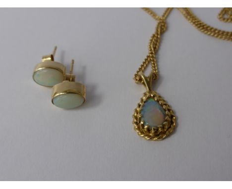 A Lady's 9ct Gold and Opal Pendant and Earrings, approx 5.6 gms