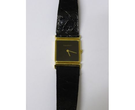 A Gentleman's Vintage 18 ct Gold Jaeger le Coultre, case weight, on a black leather strap, approx 24 gms