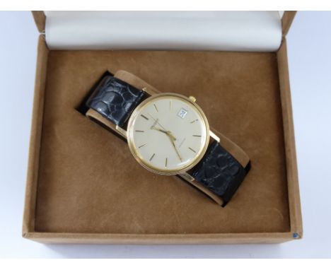 A Gentleman's Tissot 9ct Gold Wrist Watch, on black leather strap. (af)