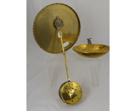 A Quantity of Brass, including a chestnut roaster, circular tray and a brass strainer and a vintage copper bed pan. (4)
