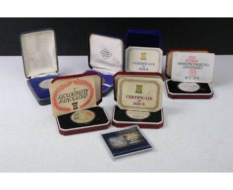 A collection of seven silver proof coin sets within original fitted display cases to include the 1975 First Referendum of the