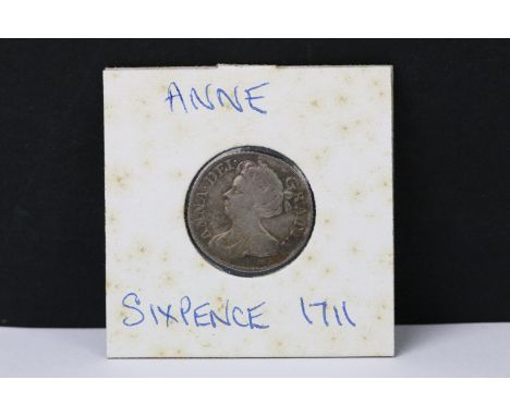 A British early milled Queen Anne 1711 silver sixpence coin. 