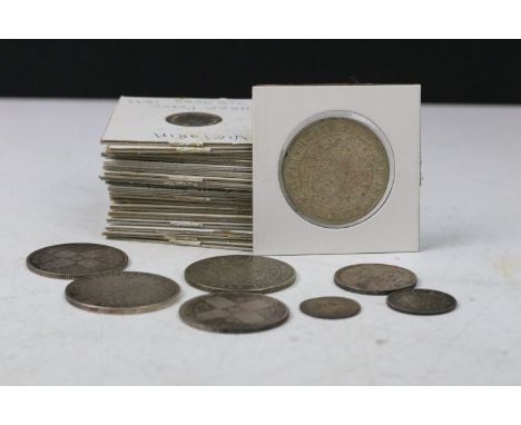 A collection of British Queen Victoria pre decimal silver coins to include half crowns, gothic florins, shillings, sixpences.