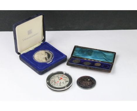 A group of three Queen Victoria silver maundy coins to include a 1838 two pence and an 1878 threepence and fourpence together