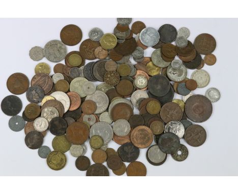 A small collection of British and world coins to include King George III and silver examples. 