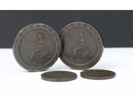 A collection of four British King George III coins to include two 1797 cartwheel two pence coins. 