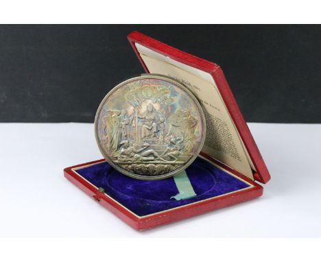 A Queen Victoria 1887 Golden Jubilee cased silver medal, designed by Sir J E Boehm and Frederick, Lord Leighton, engraved by 