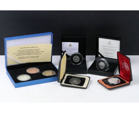 A collection of five silver proof coin sets to include two silver sovereigns, two Canadian dollars and a King George VI doubl