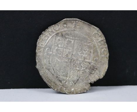 A King Charles 1st hammered silver shilling coin. 