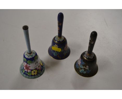 Two cloisonné hand bells; and an enamel hand bell