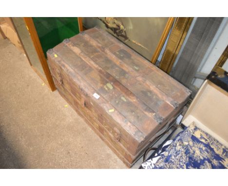 A wooden bound trunk 