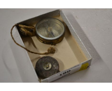 A 19th Century brass compass with silvered dial and one other small compass