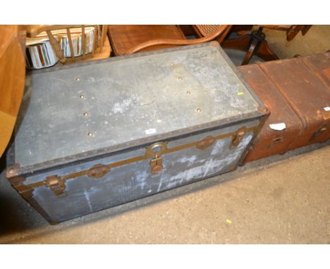 A metal bound travelling trunk 