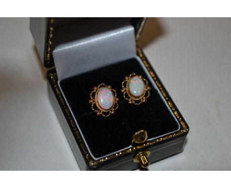 A pair of 9ct gold opal set ear-rings 