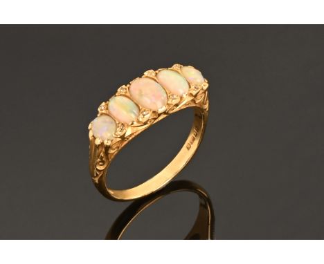 An 18 ct yellow gold opal and diamond ring.  Size R/S.