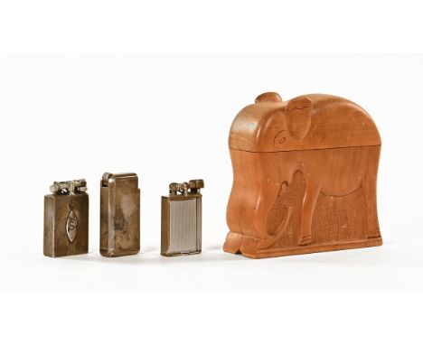 A vintage "Flaminaire" Paris cigarette lighter, two others and a table cigarette box in the form of an elephant.