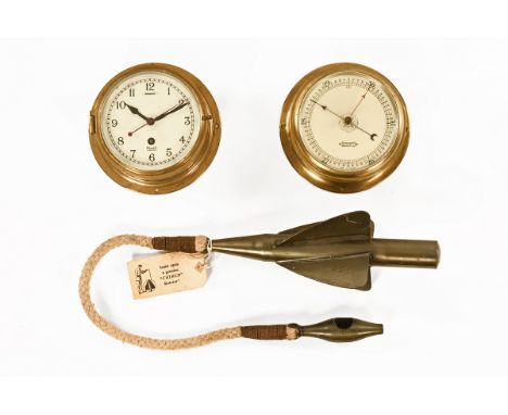 A vintage cherub rotator by Walker and Sons, together with a vintage Hezzanith brass cased barometer and Mercer ships type cl