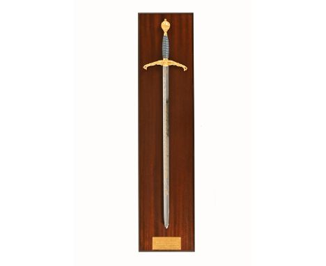 A Wilkinson commemorative RAF broadsword, commemorating 50 years of RAF since World War II, with a tempered steel blade etche