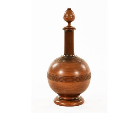 A Treen lidded flask, turned.  Height 34 cm.