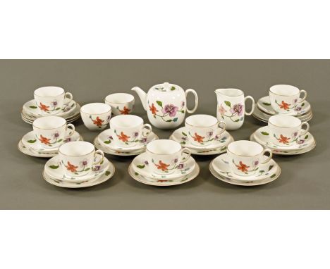 A Royal Worcester "Astley" tea set, comprising teapot, 12 plates, 9 cups, 10 saucers, 2 small basins, cream jug and teapot.