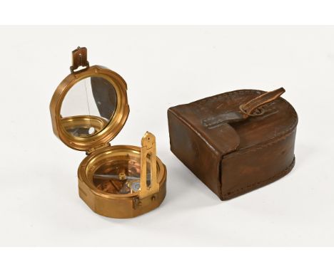 A brass cased compass, with leather carrying pouch, compass marked Makers To The Queen.