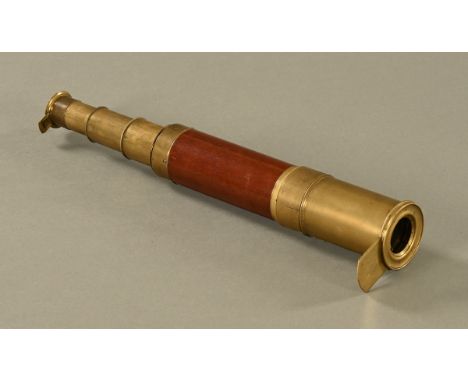 A 19th century brass and mahogany three drawer telescope.  Length extended 70 cm.