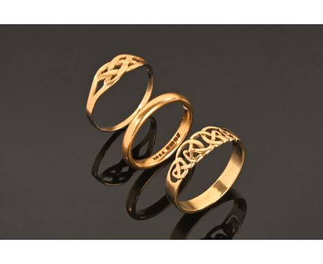 A 22 ct gold wedding band.  Size L/M, 3.8 grams, together with a 9 ct gold ring Size R, 2.1 grams, a gold coloured metal ring