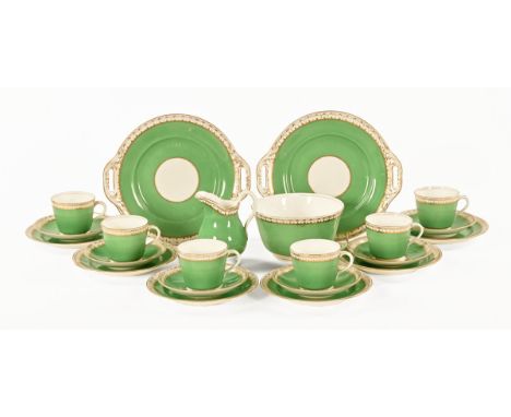 An Edwardian green and gilt tea set, 6 cups, 6 saucers, 6 plates, 2 sandwich plates, sugar basin and cream jug.