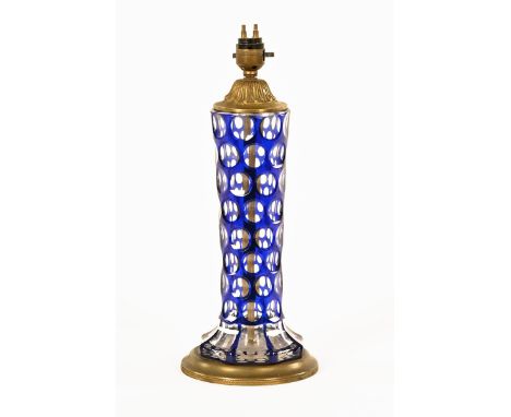 An early 20th century Bohemian blue glass and brass faceted table lamp.  Height including light fitting 36 cm.