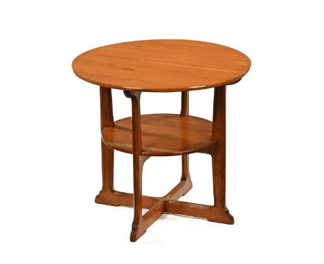 An Arthur Simpson of Kendal two tier occasional table.  Height 56 cm, diameter 62.5 cm (see illustration). CONDITION REPORT: 