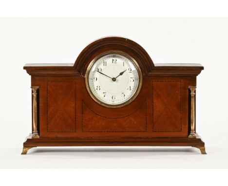 An Edwardian inlaid mahogany mantle clock, with single train movement.  Case width 31 cm. CONDITION REPORT: The movement wind
