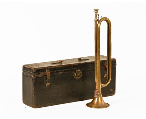 An early 20th century 17th Lancers brass bugle, with Death Or Glory motif in original leather and felt lined box, parts missi