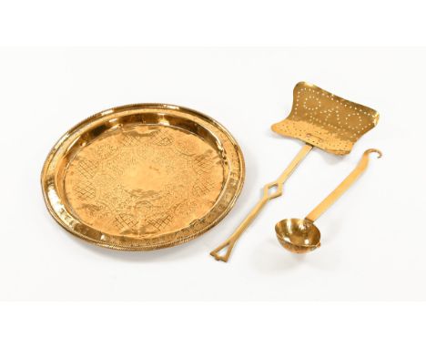A 19th century brass skim, ladle and plaque.  Diameter 45 cm.