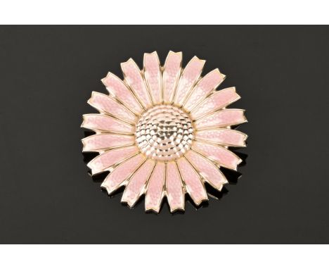 A George Jensen large pink enamel daisy pendant/brooch.  Fully hallmarked, boxed.  Diameter 45 mm. CONDITION REPORT: This bro