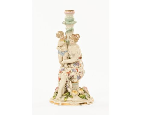 A large Sitzendorf candelabra base, figural with mother and child.  Height 36 cm.