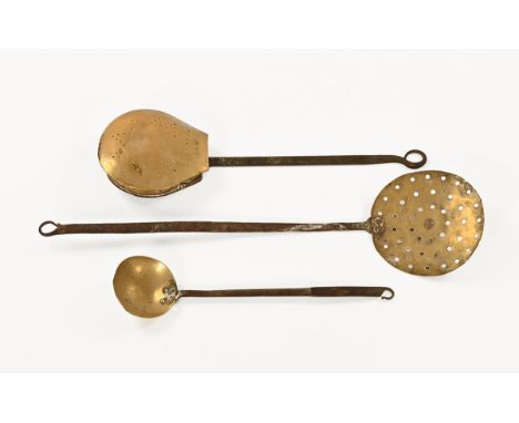 Three 19th century brass and wrought iron pieces, ladle, chestnut roaster and skim.  Longest 68 cm.