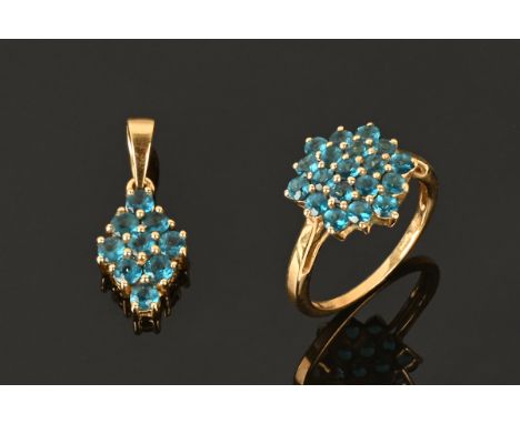 A 10 K yellow gold gem set cluster ring, with matching pendant.  Size M, stamped TGGC, combined weight 3.6 grams.