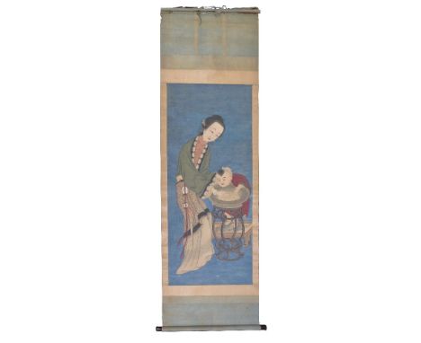 A large Chinese scroll painting of a Mother and Child, Qing Dynasty, probably early to mid 19th century, painted with a mothe