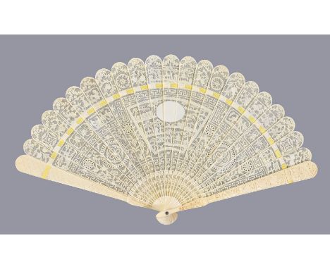 Y A Chinese ivory brise fan, Canton, first quarter of the 19th century, carved on one side, with blank oval reserve within fa