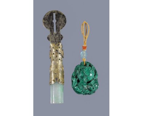 A Chinese malachite 'fruit' pendant, Qing Dynasty, carved with ripe fruit and foliage, 4.5cm high x 3.5cm wide x 1.7cm deep a