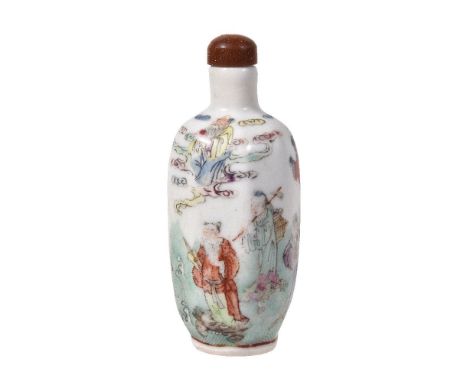 A Chinese Famille Rose porcelain octagonal snuff bottle, Qing Dynasty, 19th century, with Shoulao in clouds above the Eight I