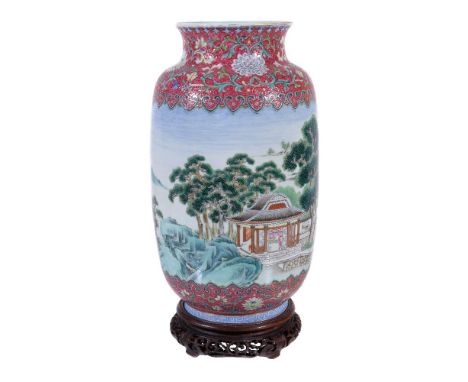 A good Chinese Famille Rose vase, Republican Period, the shoulder and foot decorated with foliate scrolls against a magenta s