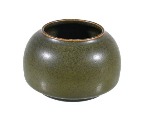 A Chinese tea-dust glazed water pot, probably late Qing Dynasty, covered overall with an olive-green glaze, the pot rim and t