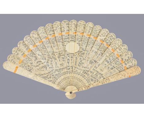 Y A Chinese ivory brise fan, Canton, first quarter of the 19th century, with blank oval reserve, carved on one side with figu