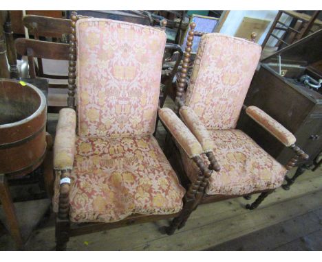 A pair of bobbin turned armchairs, with cane seats and cushions, one cane seat is badly damaged