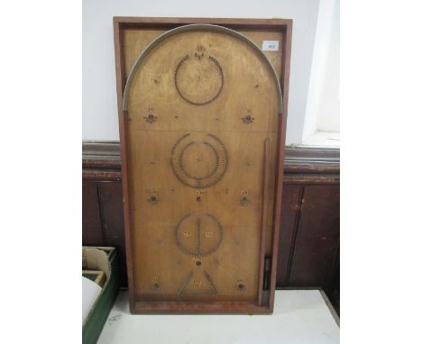 A Bagatelle board&nbsp;