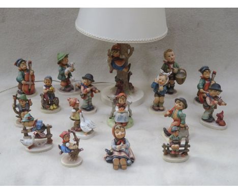 COLLECTION OF VARIOUS GEOBELS UNGLAZED FIGURES BY MJ HUMMELL PLUS TABLE LAMP (SOME AT FAULT)