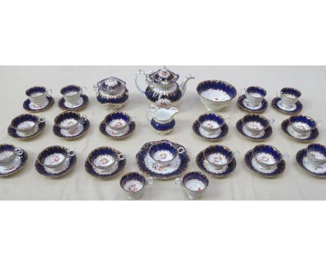 COALPORT ADELAIDE COBALT BLUE HANDPAINTED AND GILDED TEA SERVICE, APPROXIMATELY FORTY-PLUS PIECES, DECORATED WITH HANDPAINTED